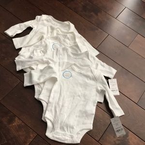 5 Carters long sleeve bodysuits. Size 3m. NWT